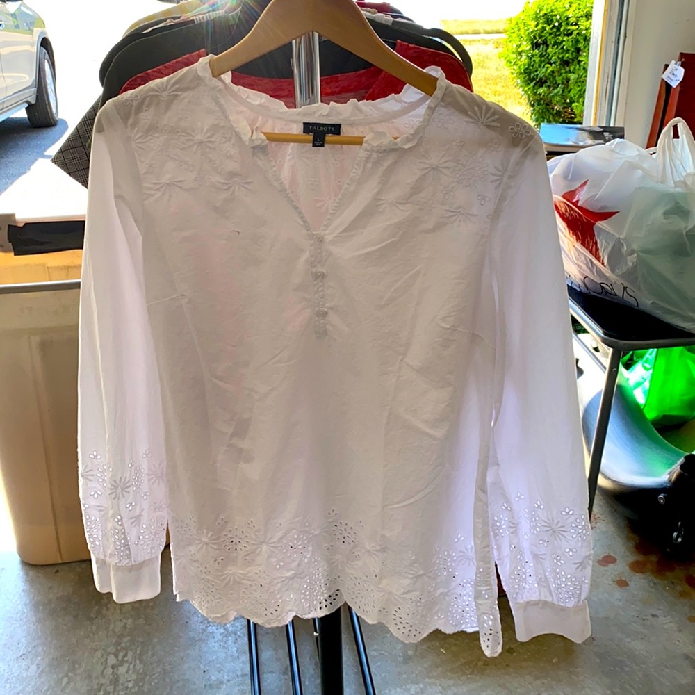 White blouse with battigerg trim